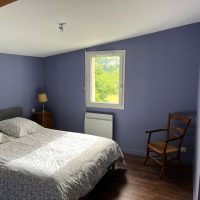 Chambre Soleil le(pon)ant de Cresta Domi, ambiance chaleureuse et vue imprenable sur le Cantal